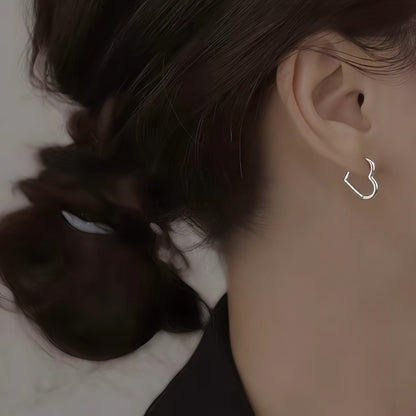 Hjerteformede øreringe i rustfrit stål i guld 