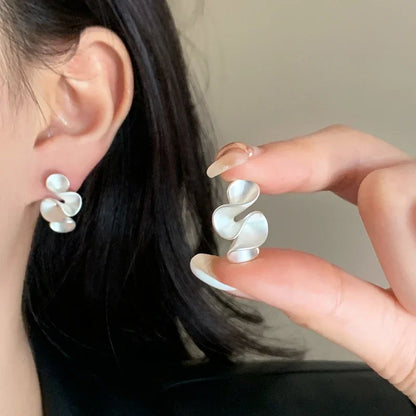 Örhängen i 18K guld och Silver 